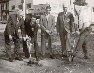 Mayor Frank J. Reynolds, Wayne R. Starr, president of Citizens State Bank & Trust Company, Donald Madsen, director of the Brown County Department of Social Welfare, J.W. Patton, vice president and trust officer of Citizens; and Glenn Plamann, Brown County Commissioner and chairman of the county Welfare Board